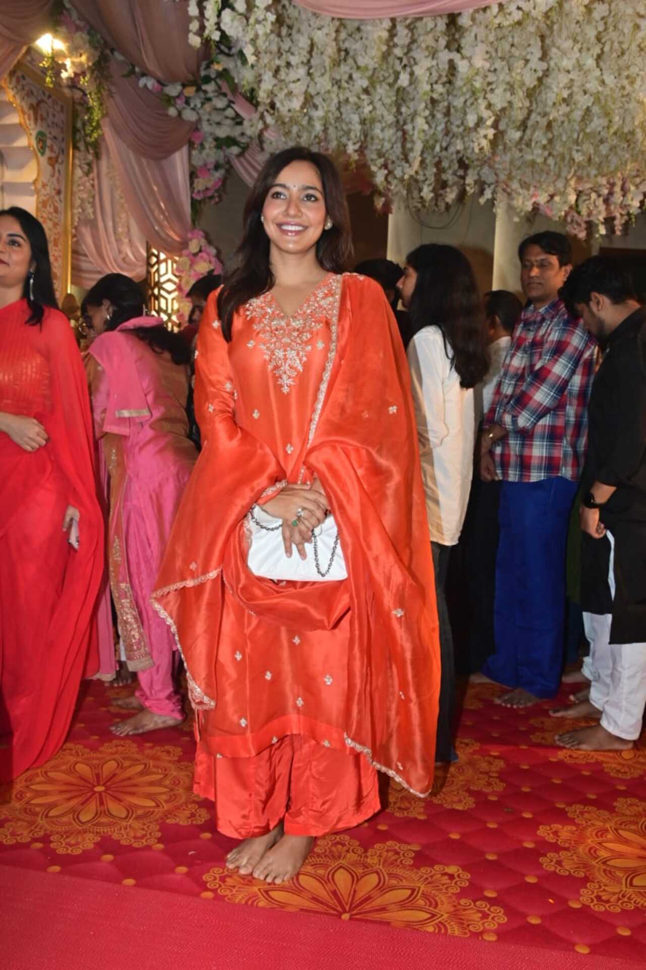 Neha Sharma looked breathtaking in a ravishing red ethnic attire with delicate patchwork on it. he beamed with joy as she posed for pics. 